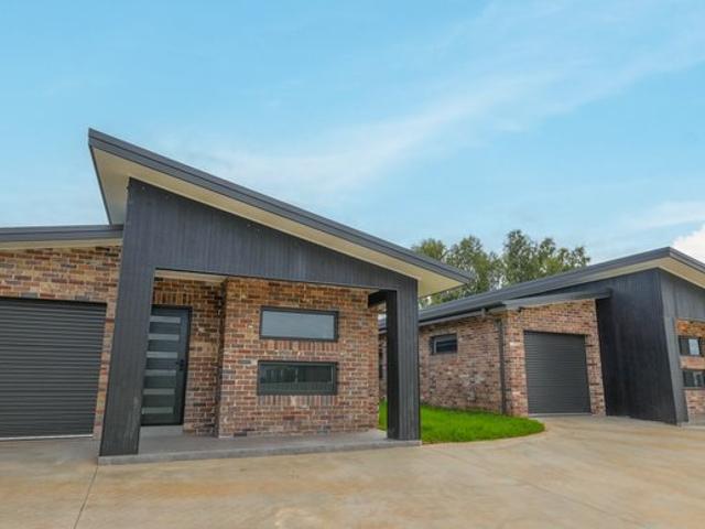 Brand New Modern Duplexes Buy One or Both! The Ultimate Home or Investment Opportunity