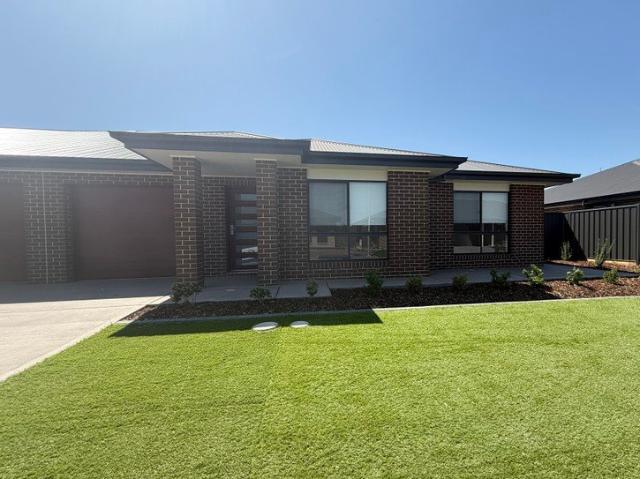 BRAND NEW MODERN FOUR BEDROOM DUPLEX IN GATED ESTATE