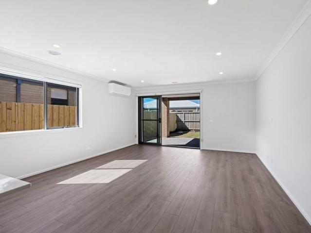 Brand New Modern & Spacious Family Home with Low Maintenance Living!