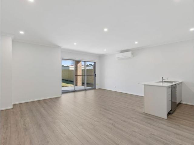 Brand New Modern & Spacious Family Home with Low Maintenance Living!