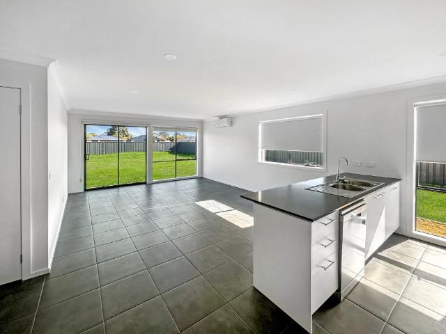 Brand New Modern 4 Bedroom Home on Generous Block!