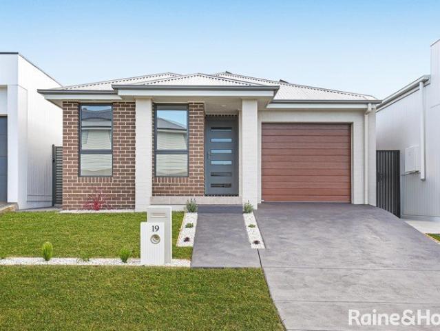 Brand New McDonald Jones Home With Solar Panels & EV Charger