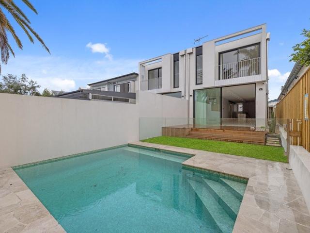 Brand New North Facing Semi With Large Garage & Heated Pool!