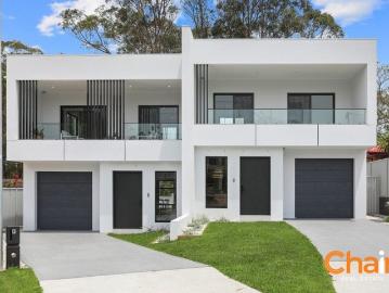 Impressive Full Brick Duplex Offering Modern Luxury
