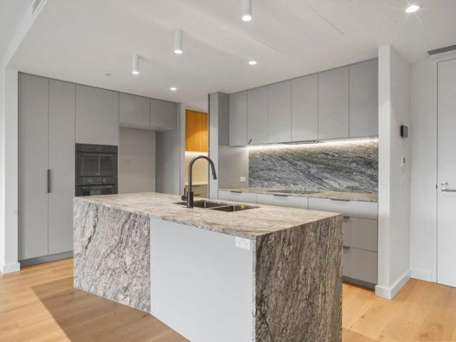 Brand New Sophisticated 2 Bedroom Residence with Media Room, City Views & Rooftop Pool 2 Bedrooms | 2 Bathrooms | Media Room | 1 Car Space