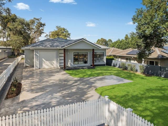 Brand New Single Level Living with Exceptional Convenience
