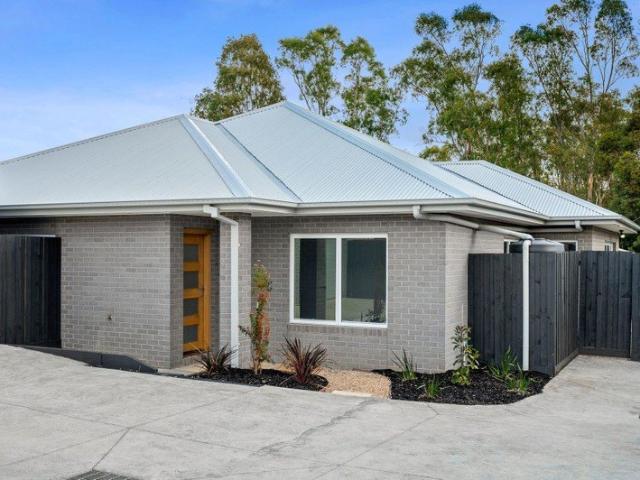 Brand New Single Level Town Residence In Central Location