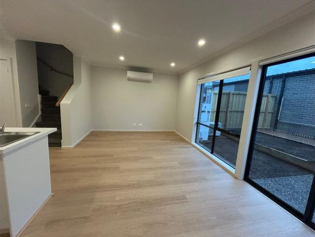 Brand New Townhome with Double Garage & Premium Finishes
