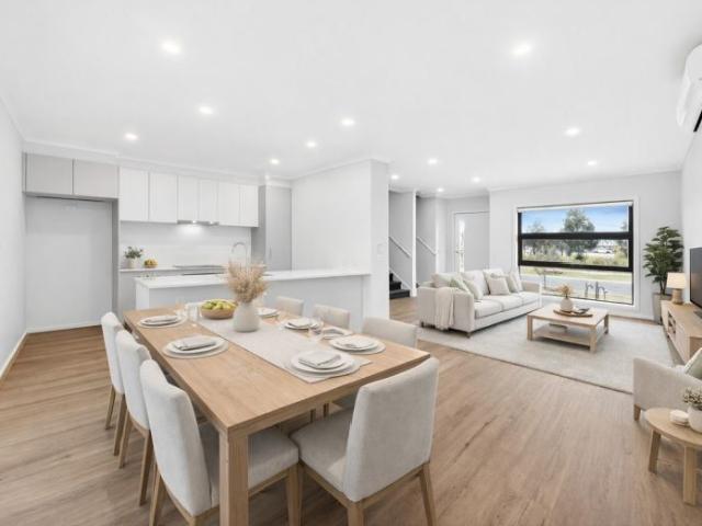 Brand new townhouse with stunning park facing views in the sought after Riverwalk Estate !