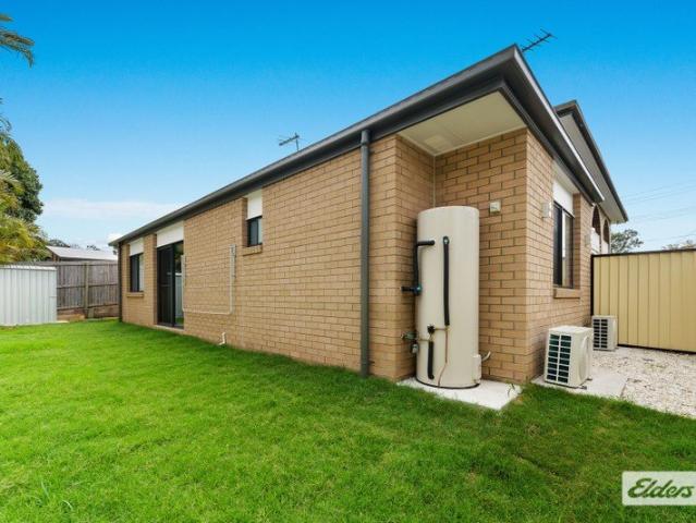 Brand New Two Bedroom Auxiliary Unit with Private, Fully Fenced Backyard