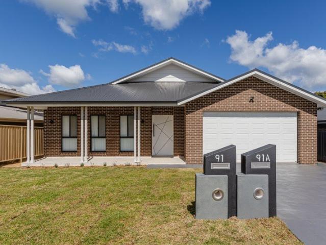 Brand New TWO HOMES. TWO INCOMES. ONE TITLE