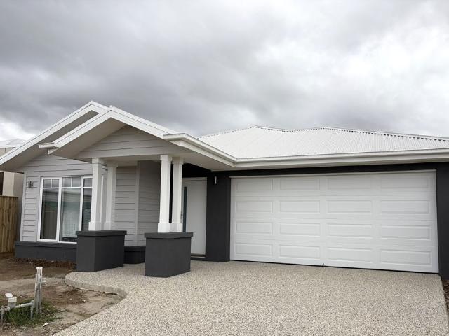 BRAND NEW, TWO LIVING, FOUR BEDROOM HOME IN KINGSTON HAVEN ESTATE