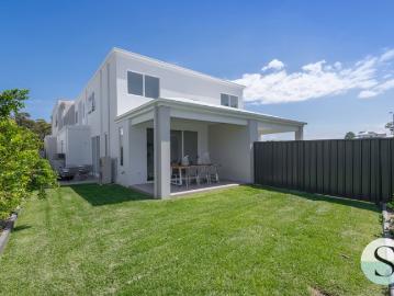 Brand Spanking New, Fabulous, Family Size Home with 2 Living Areas, North Facing Easy Care Grounds, Great Rental Return Potential & Depreciation!