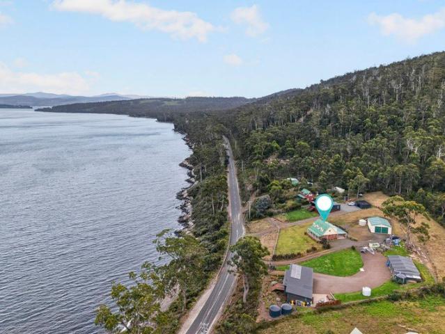 Breathtaking Channel Views, Spacious Family Living & Exceptional Workshop Potential
