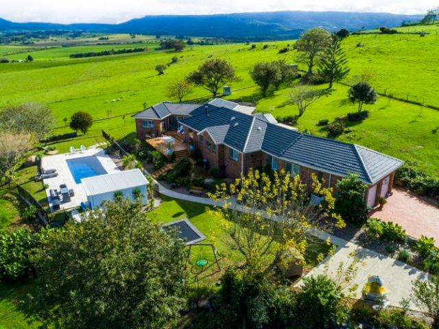 Breathtaking Acreage Living with Stunning Views & Designer Pool House