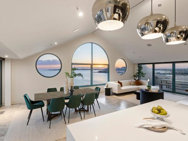 Breathtaking Beachfront Penthouse with Sweeping Bay Views