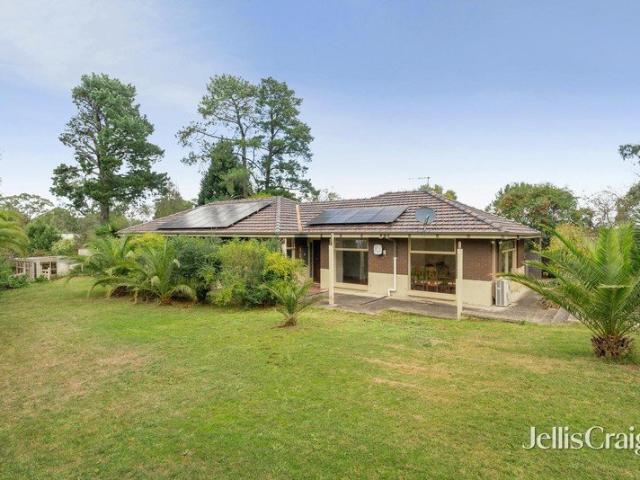 Breathtaking high side property with valley vistas and enormous potential