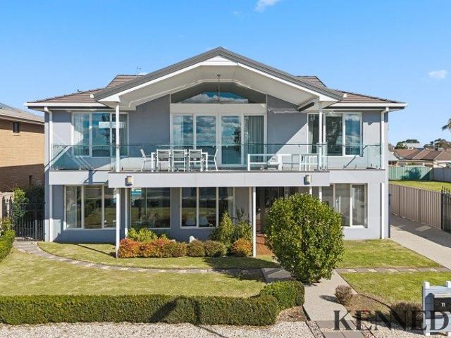 Breathtaking Lake Views & Exceptional Entertaining