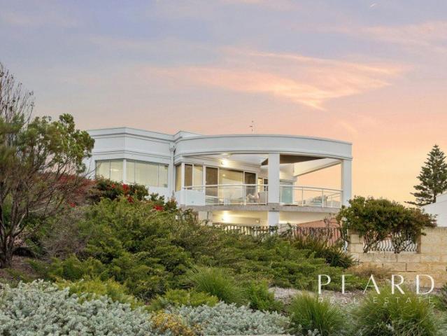 BREATHTAKING VIEWS, ARCHITECTURAL DESIGN AND FUNCTIONAL FAMILY LIVING ALL IN A QUIET STREET WHERE HOMES RARELY CHANGE HANDS