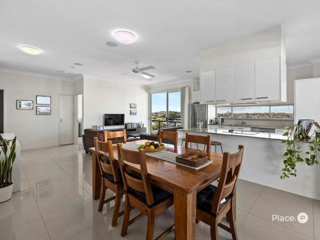Breezy Elevation, Expansive Living and Sweeping Suburban Views