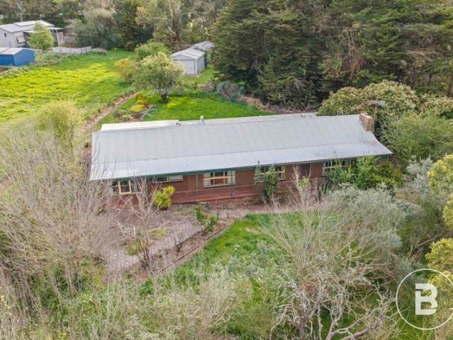 BRICK HOME ON MASSIVE BLOCK IN MEREDITH TOWNSHIP