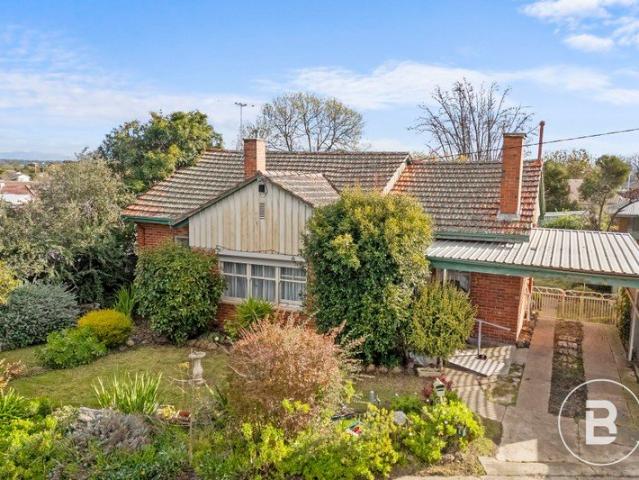 BRICK HOME ON A SPACIOUS ALLOTMENT