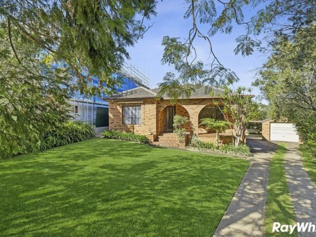 Brick home on sprawling 689sqm parcel, development potential
