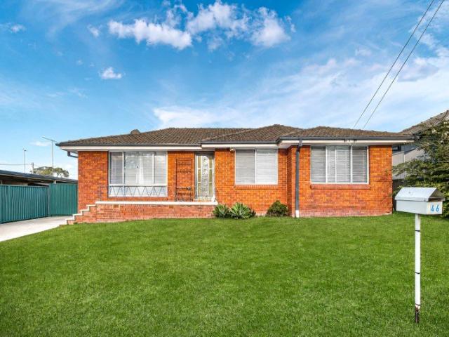 BRICK HOME IN PRIME LOCATION
