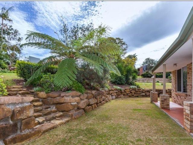 Brick single level living near the golf course