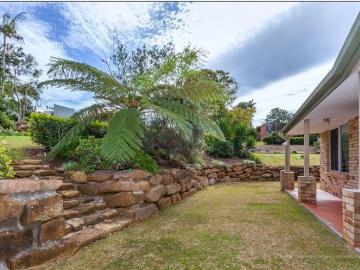 Brick single level living near the golf course