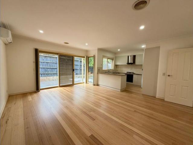 Bright 3 bed, 2 bath unit with solar, deck and double garage