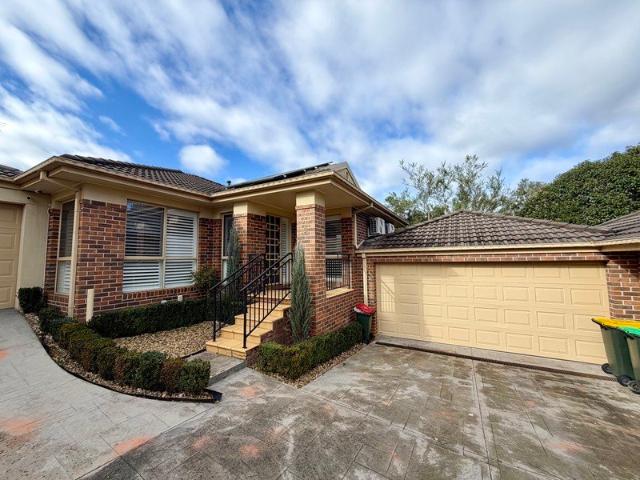 Bright 3 bed, 2 bath unit with solar, deck and double garage
