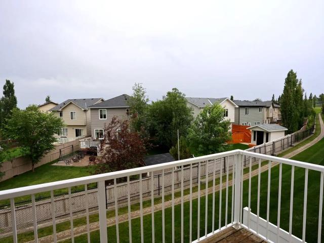 Bright 3 Bedroom Townhome with Front Garage in Panorama Hills NW
