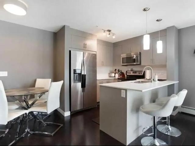 Bright Corner Unit with 2 parking available 2 bed and 2 bath — 2 Bedrooms Condo Unit