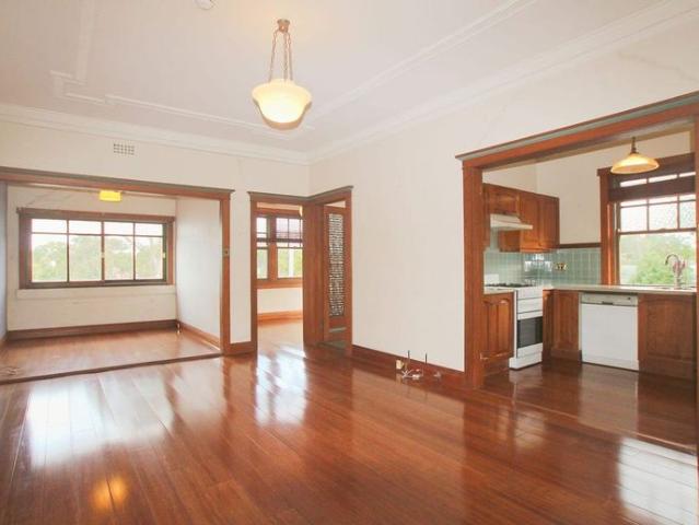 Bright and character filled ultra conveniently located unit