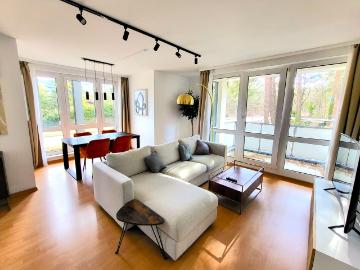Bright and quiet living surrounded by forest and water