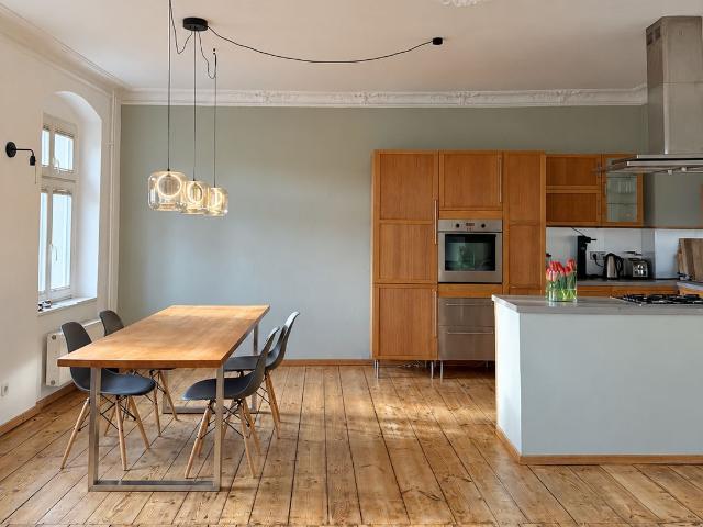 Bright Altbau apartment with period details and an eat in kitchen in Prenzlauer Berg