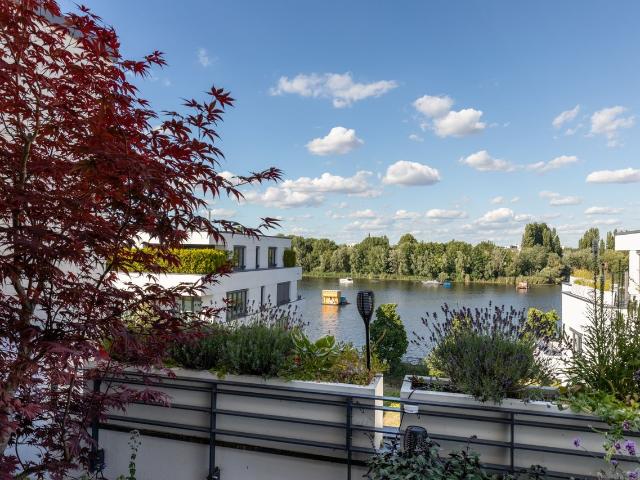 Bright apartment with lake view and big terrace in a quiet central location on Stralau, Berlin Amsterdam Apartments for Rent