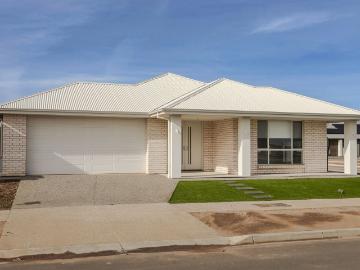 BRIGHT, BOLD AND SPACIOUS, LOW MAINTENANCE HOME