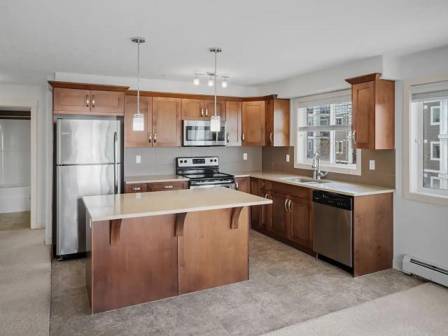 Bright & Beautiful 2 Bedroom + DEN Condo in Desirable SAGE HILL NW — 2 Bedrooms+ Den Condo Unit