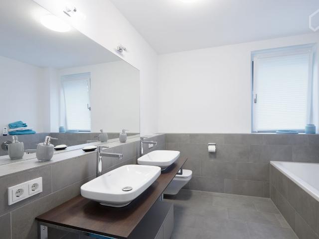 Bright modern apartment with high quality equipment and large garden terrace right at the beginning of the Bahnstadt, Heidelberg Amsterdam Apartments for Rent