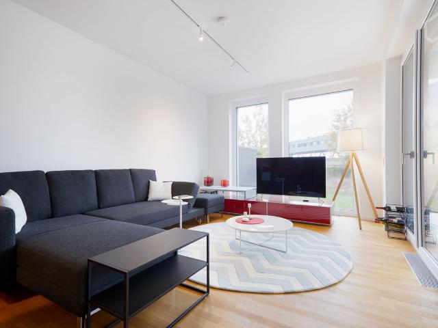 Bright modern apartment with high quality equipment and large garden terrace right at the beginning of the Bahnstadt, Heidelberg Amsterdam Apartments for Rent