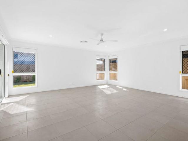 Bright & Modern 4 Bedroom Home with Media Room in Prime Location