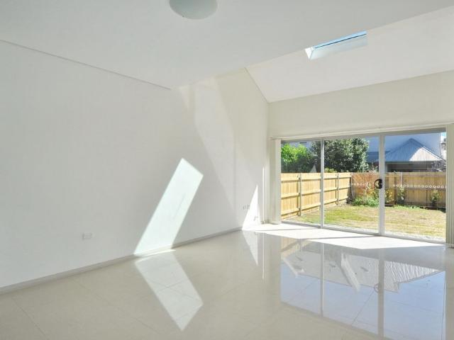 Bright, private & contemporary spacious floor plan set in a quiet & convenient location