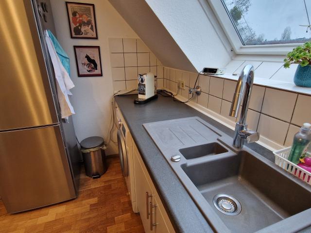 Bright, quiet attic apartment with winter garden and balcony as well as bathtub and high quality equipment