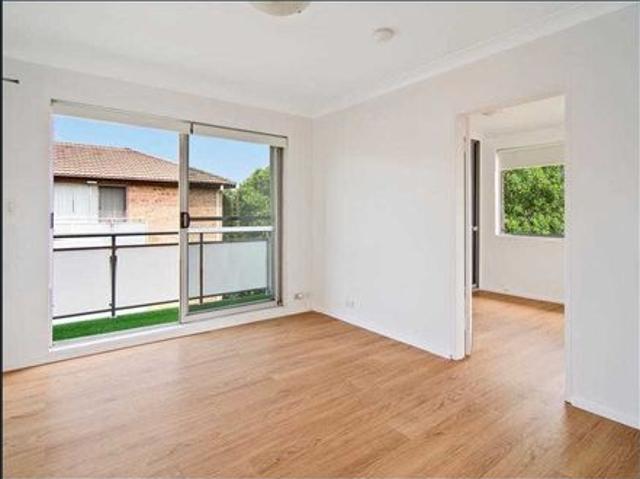 Bright Top Floor Apartment with Balcony and Parking