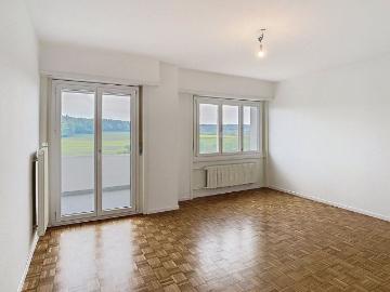Bright, through house apartment with stunning views and two balconies!