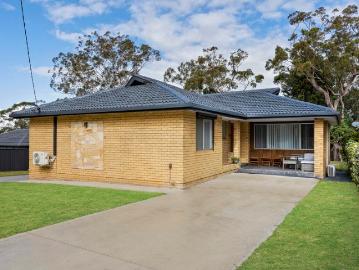 A Brilliant Block with a Beautiful Home Backing Bushland