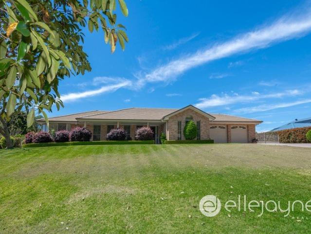 BRILLIANT FOUR BEDROOM HOME WITH SIDE ACCESS TO LARGE SHED ON 1600M2 BLOCK IN EXCLUSIVE HAMPTON RIDGE ESTATE COORANBONG