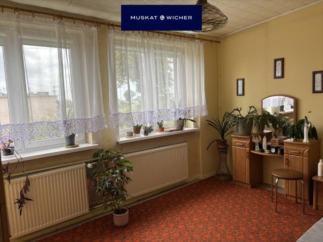 Do sprzedania przestronne mieszkanie 72 m² z garażem i działką